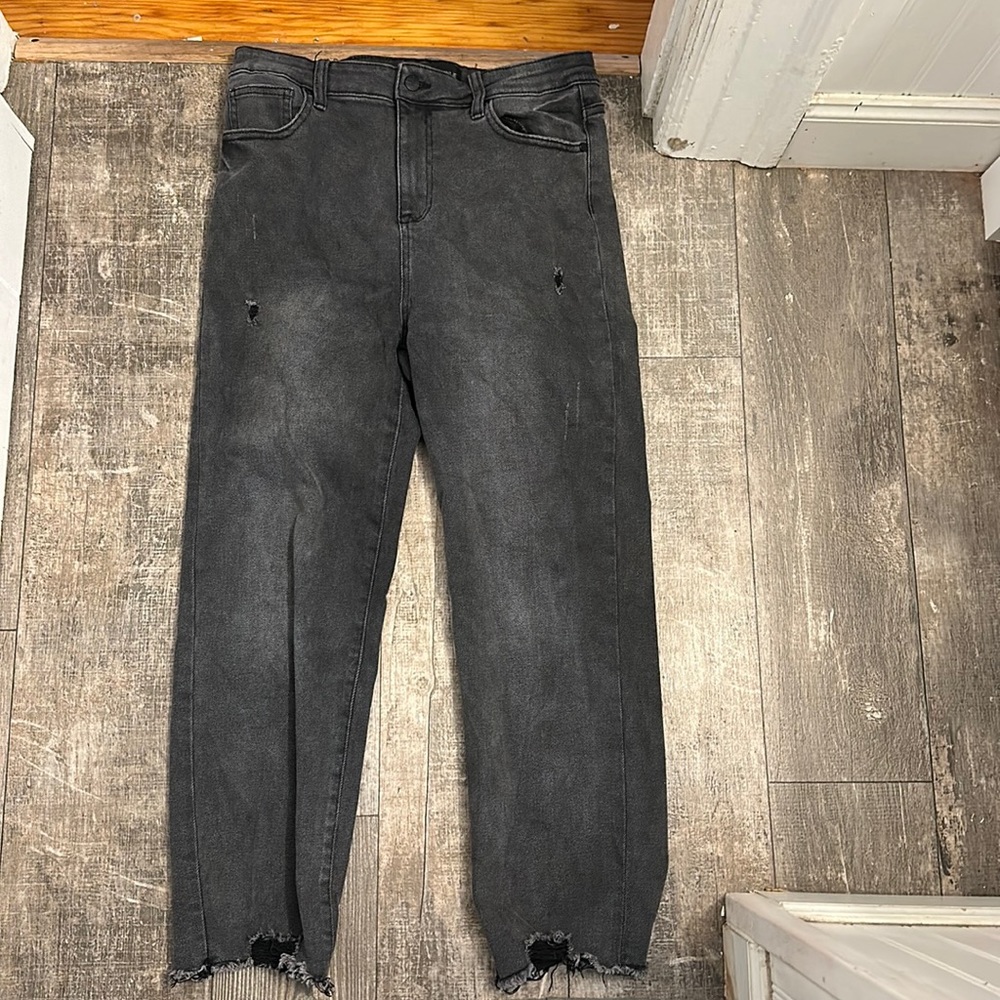 Distressed charcoal jeans